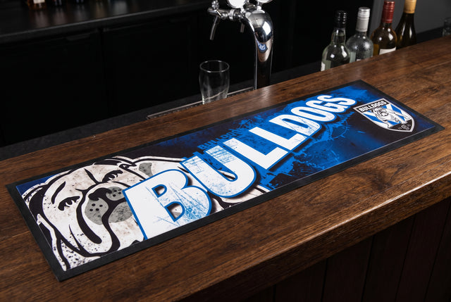 Canterbury-Bankstown Bulldogs NRL Premium Rubber-Backed Bar Mat Runner on a bar top