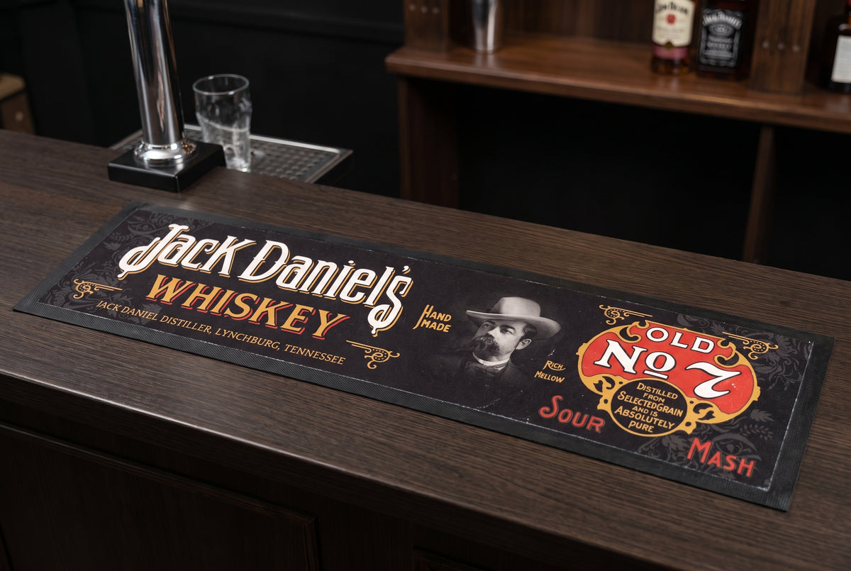 Jack Daniel's Whiskey Premium Rubber-Backed Bar Mat Runner on a bar top