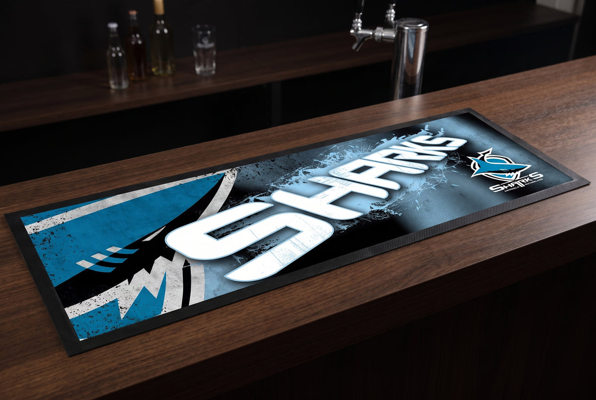 Cronulla Sharks NRL Premium Rubber-Backed Bar Mat Runner on a bar top