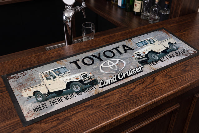 Toyota Land Cruiser Premium Rubber-Backed Bar Mat Runner on a bar top
