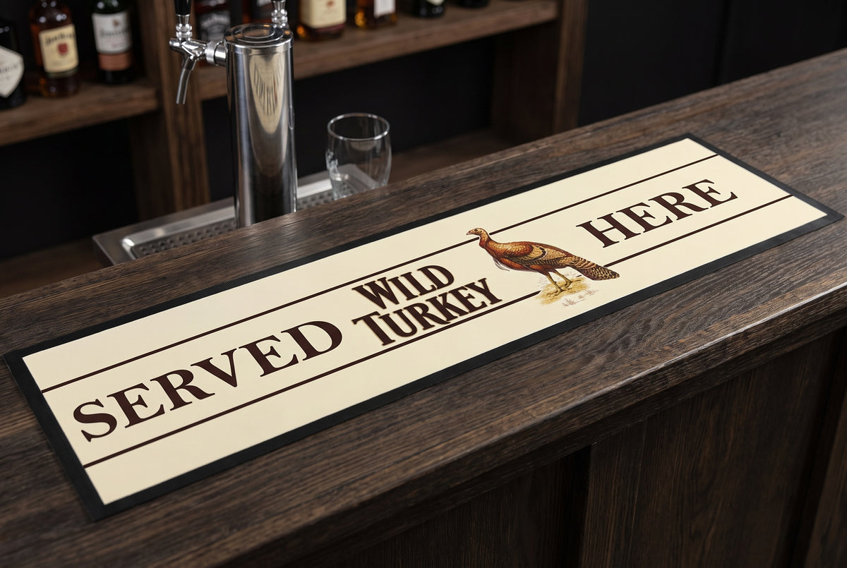 Wild Turkey Gold Premium Rubber-Backed Bar Mat Runner on a bar top