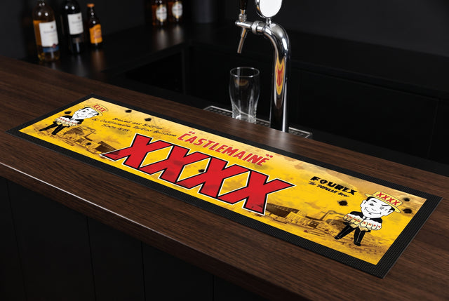 XXXX Castlemaine Premium Rubber-Backed Bar Mat Runner on a bar top