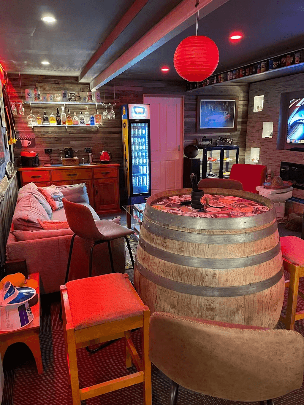 Golden Fleece Fuel Pump Branded Skinny Upright Bar Fridge - Model SS-P160-FP-FLEECE styled in home bar setting