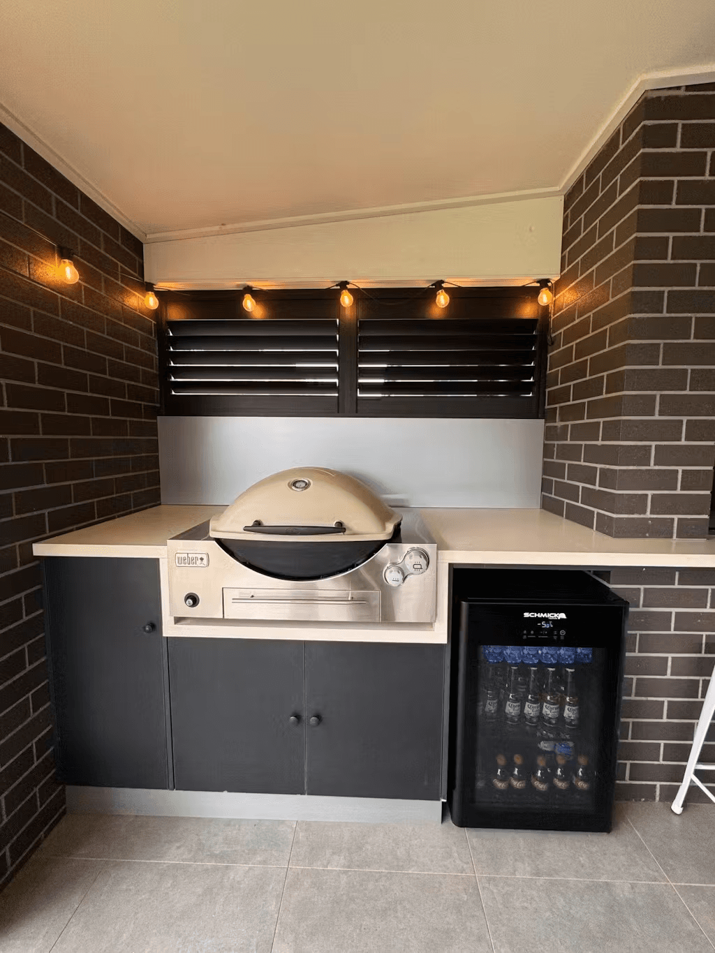 Schmick Alfresco Under Zero Australia's Coldest Beer Party Fridge With Blast Chill Mode - Model HUS-EX108 styled in outdoor entertaining setting