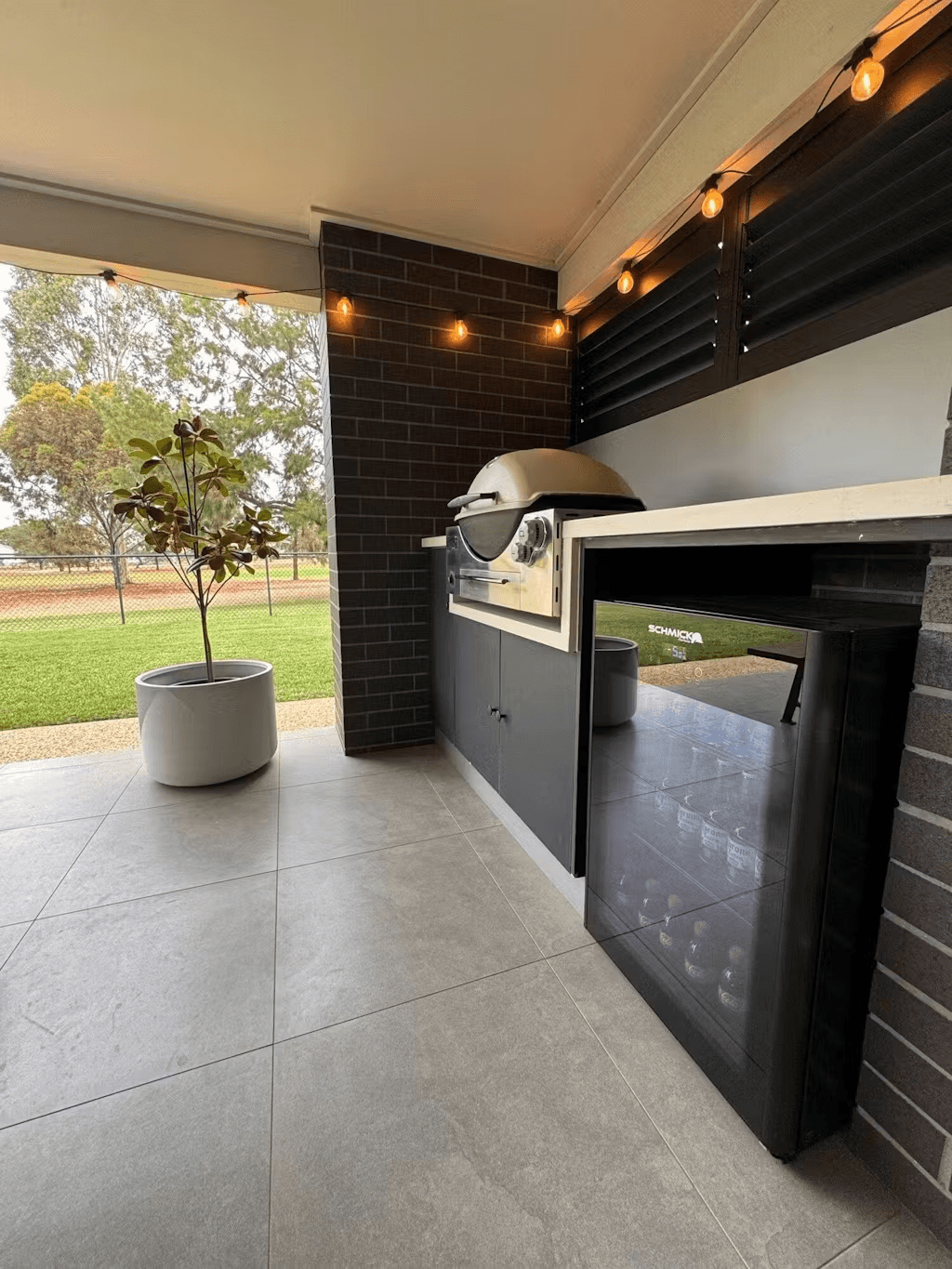 Schmick Alfresco Under Zero Australia's Coldest Beer Party Fridge With Blast Chill Mode - Model HUS-EX108 styled in outdoor entertaining setting