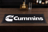 Cummins Black Premium Rubber-Backed Bar Mat Runner on a bar top
