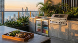 Rhino ENV1H 1-door outdoor bar fridge built into rooftop alfresco kitchen with city views