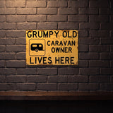 GRUMPY CARAVAN OWNER 600 MM X 400 MM METAL SIGN