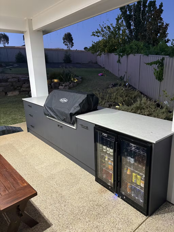 Schmick Black Quiet Running Front Venting Under Bench Heated Glass 2 Door Bar Fridge - Model  SK245-B-HD — Outdoor Entertaining lifestyle setting