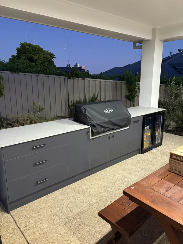 Schmick Black Quiet Running Front Venting Under Bench Heated Glass 2 Door Bar Fridge - Model  SK245-B-HD — Outdoor Entertaining lifestyle setting