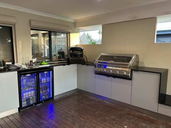 Schmick Black Quiet Running Front Venting Under Bench Heated Glass 2 Door Bar Fridge - Model  SK245-B-HD — Outdoor Entertaining lifestyle setting