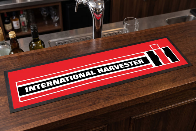 International Harvester Premium Rubber-Backed Bar Runner on a bar top