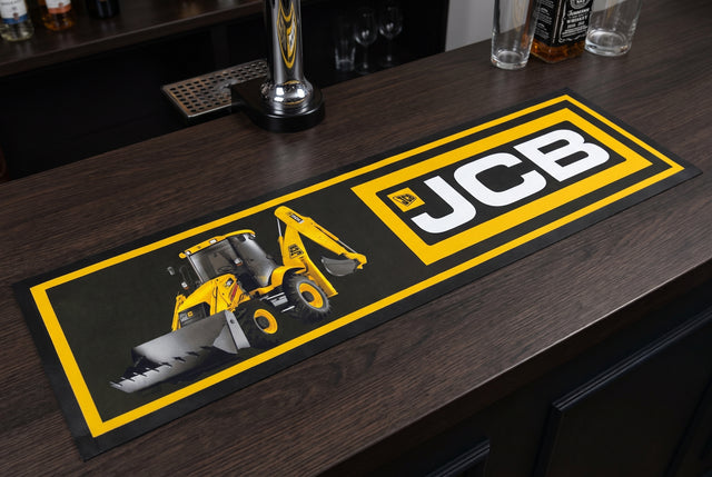 JCB Earthworks Premium Rubber-Backed Bar Runner on a bar top
