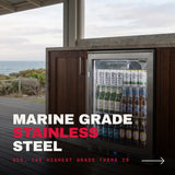 Rhino ENV outdoor bar fridge built into timber outdoor kitchen cabinetry on the covered deck of an Australian coastal house