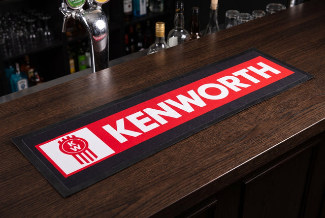 Kenworth Red Bar Premium Rubber-Backed Bar Mat Runner on a bar top