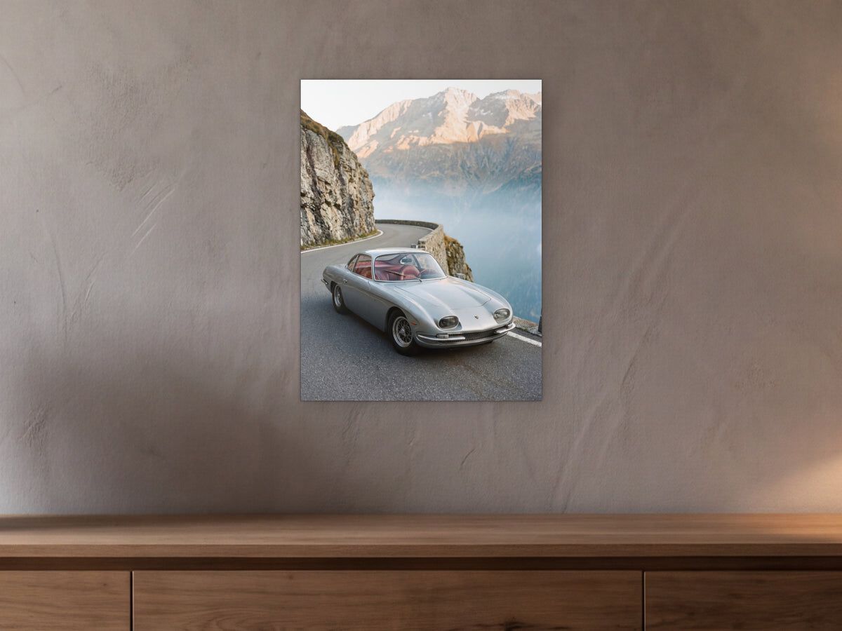 Lamborghini 350 GT - Alpine Pass shown in a beamed room with a greige plaster wall above a long oak sideboard - scale render at 45 x 60 cm