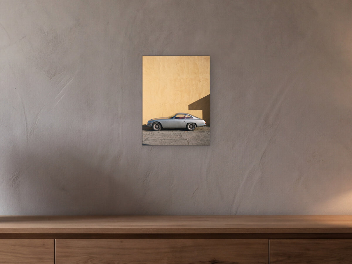 Lamborghini 350 GT - Ochre Wall shown in a beamed room with a greige plaster wall above a long oak sideboard - scale render at 30 x 40 cm