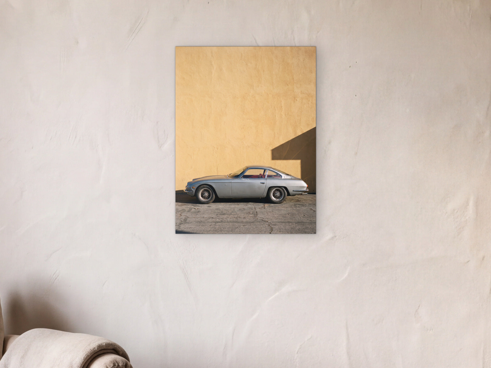 Lamborghini 350 GT - Ochre Wall shown in a limewash reading corner beside an armchair and a floor lamp - scale render at 45 x 60 cm
