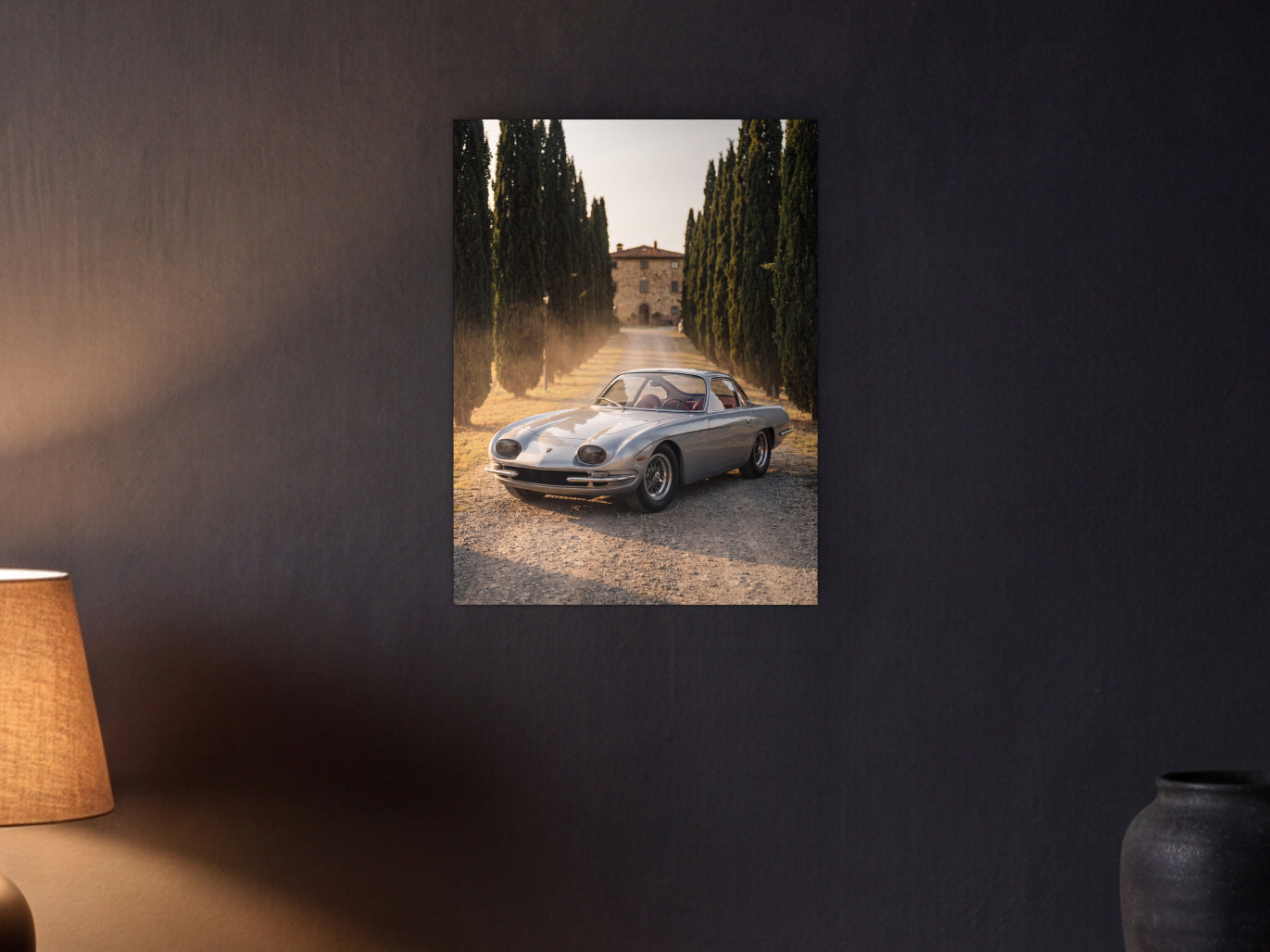 Lamborghini 350 GT - Cypress Avenue shown in a graphite plaster wall at night, lit by a console lamp - scale render at 45 x 60 cm