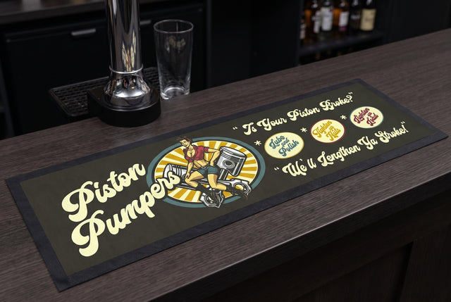 Piston Pumpers Premium Rubber-Backed Bar Mat Runner on a bar top