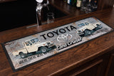 Toyota Land Cruiser Premium Rubber-Backed Bar Mat Runner on a bar top