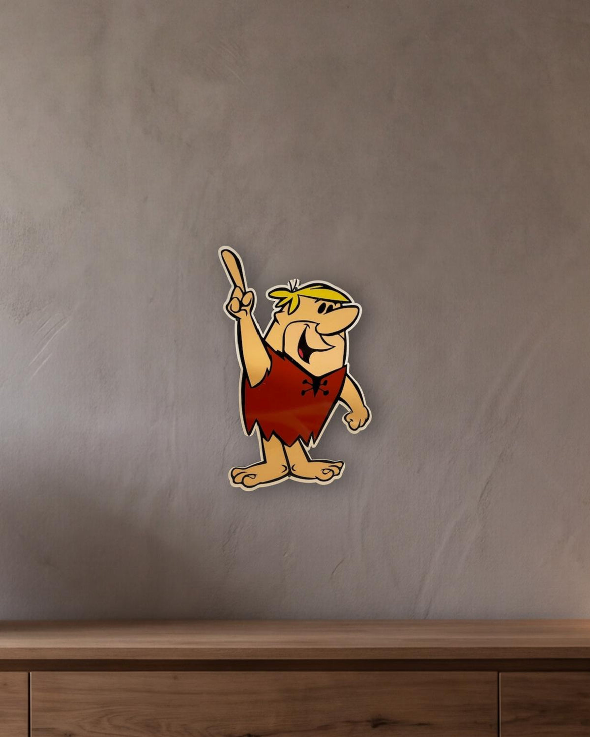 Barney Rubble Retro Metal Sign - 300 x 500mm shown in a room with a long oak sideboard - scale render at 300 x 500mm