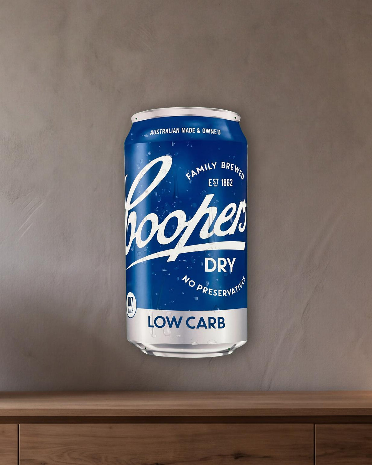 Coopers Dry Beer Can Retro Metal Sign - 380 x 810mm shown in a room with a long oak sideboard - scale render at 380 x 810mm