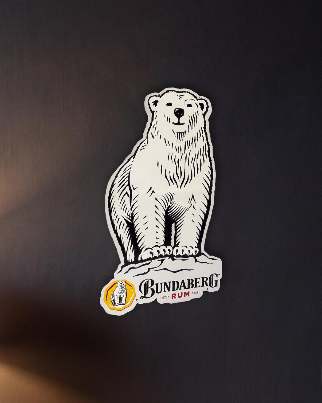 Bundy Bear Die-cut Retro Metal Sign - 500 x 850mm shown in a night console - scale render at 500 x 850mm