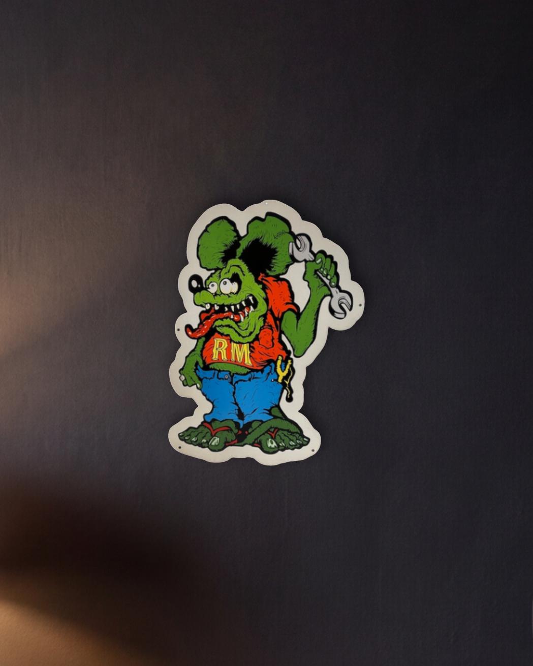 Rat Fink Mechanic Retro Metal Sign - 430 x 600mm shown in a night console - scale render at 430 x 600mm