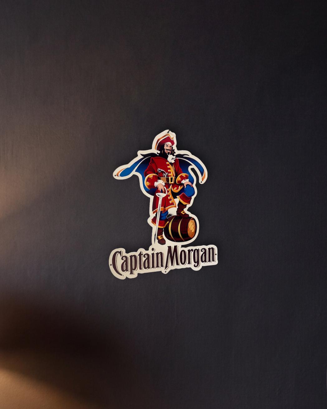 Captain Morgan Retro Metal Sign - 450 x 550mm shown in a night console - scale render at 450 x 550mm