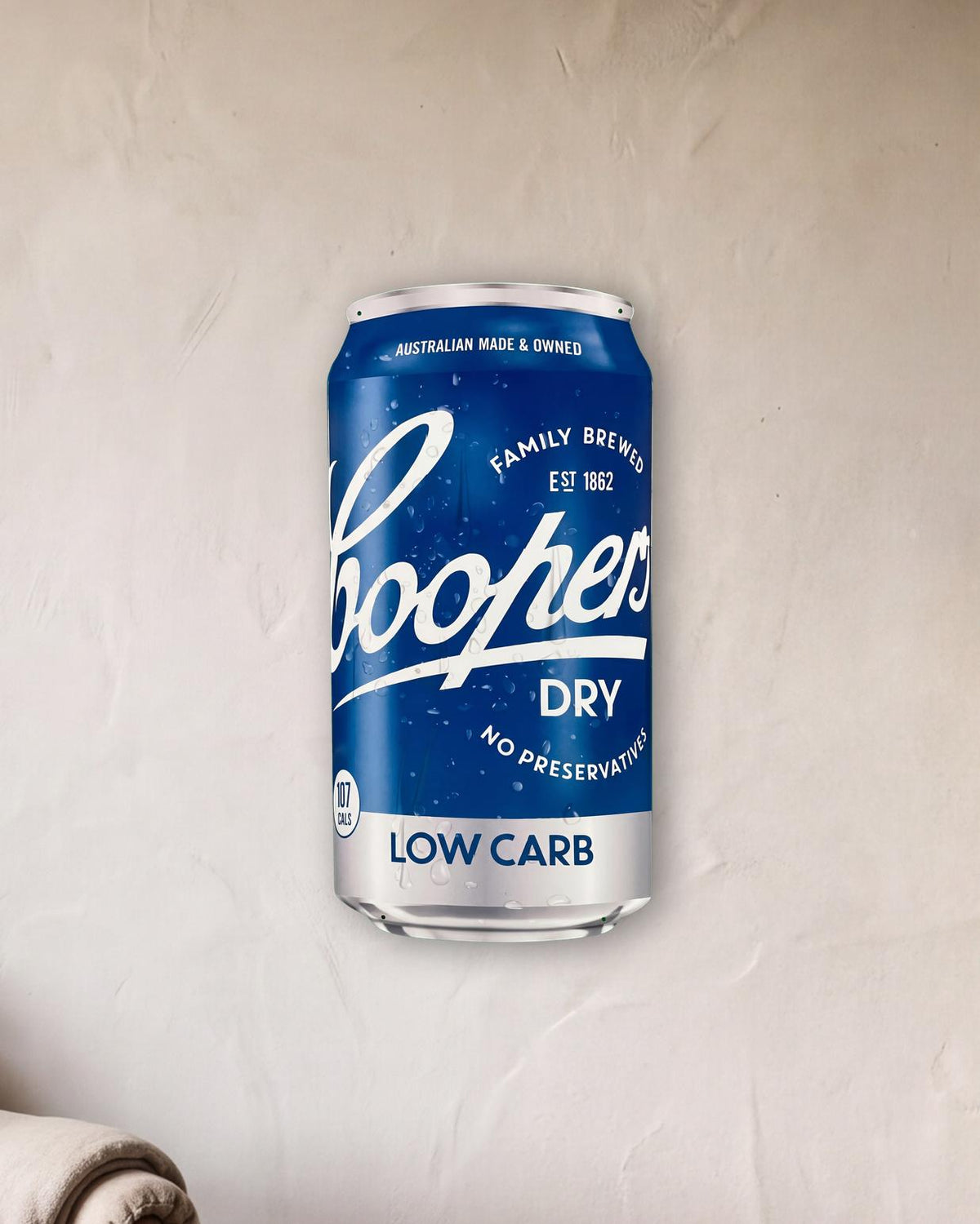 Coopers Dry Beer Can Retro Metal Sign - 380 x 810mm shown in a reading corner - scale render at 380 x 810mm