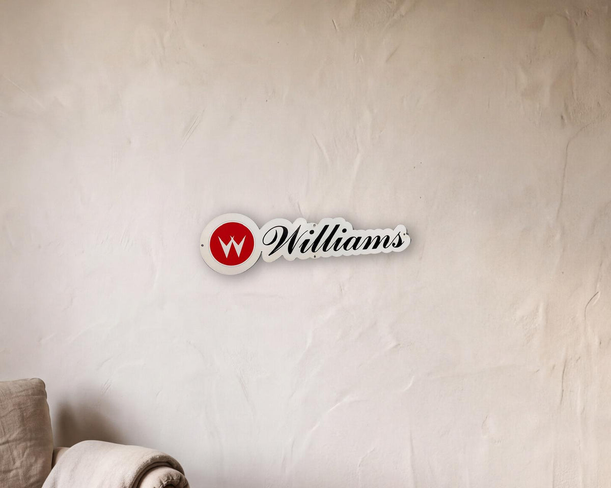 Williams Pinball Retro Metal Sign - 650 x 160mm shown in a reading corner - scale render at 650 x 160mm