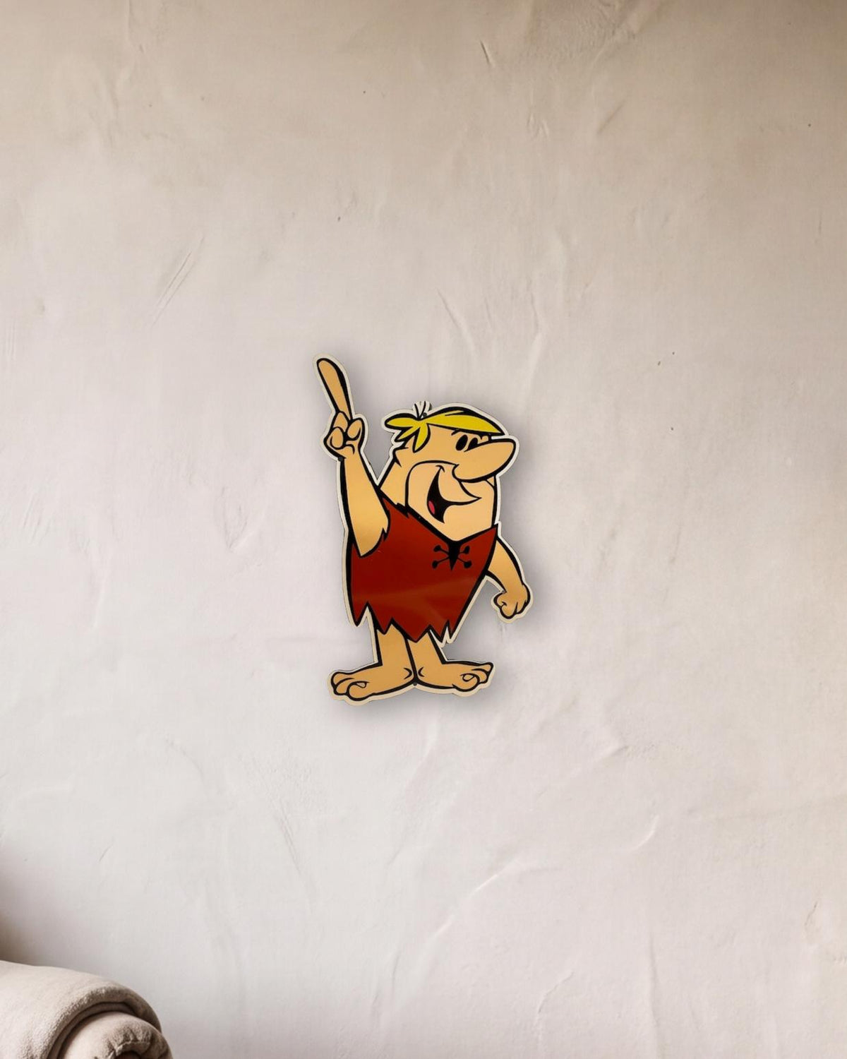 Barney Rubble Retro Metal Sign - 300 x 500mm shown in a reading corner - scale render at 300 x 500mm