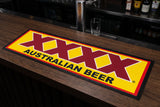 XXXX Australian Beer Premium Rubber-Backed Bar Mat Runner on a bar top